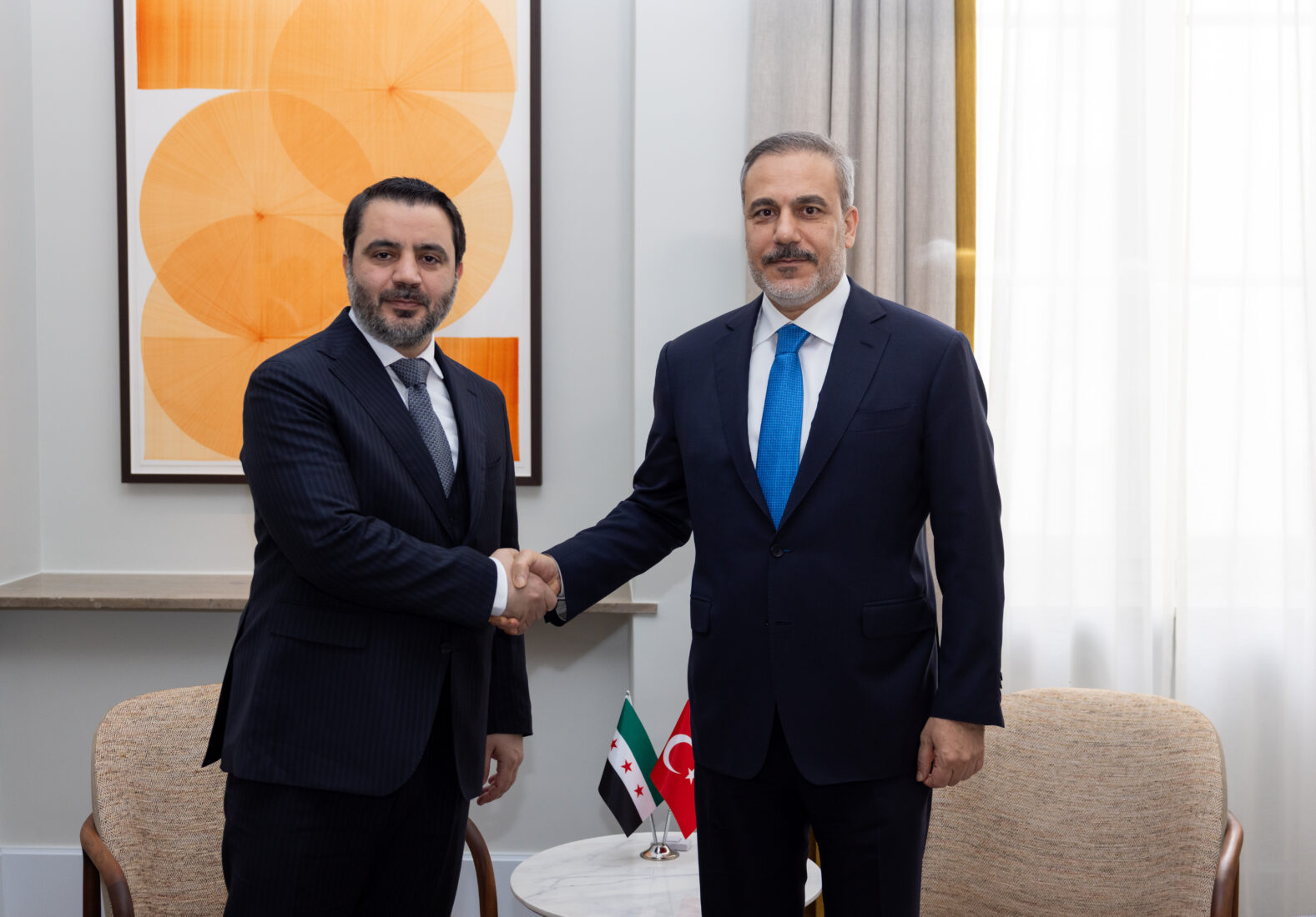 FM Hakan Fidan (R) meets with Minister of Foreign Affairs of the new Syrian government Assad Hassan Shaybani (L) on the sidelines of the 61st Munich Security Conference in Munich, German, Feb. 15, 2025. (AA Photo)