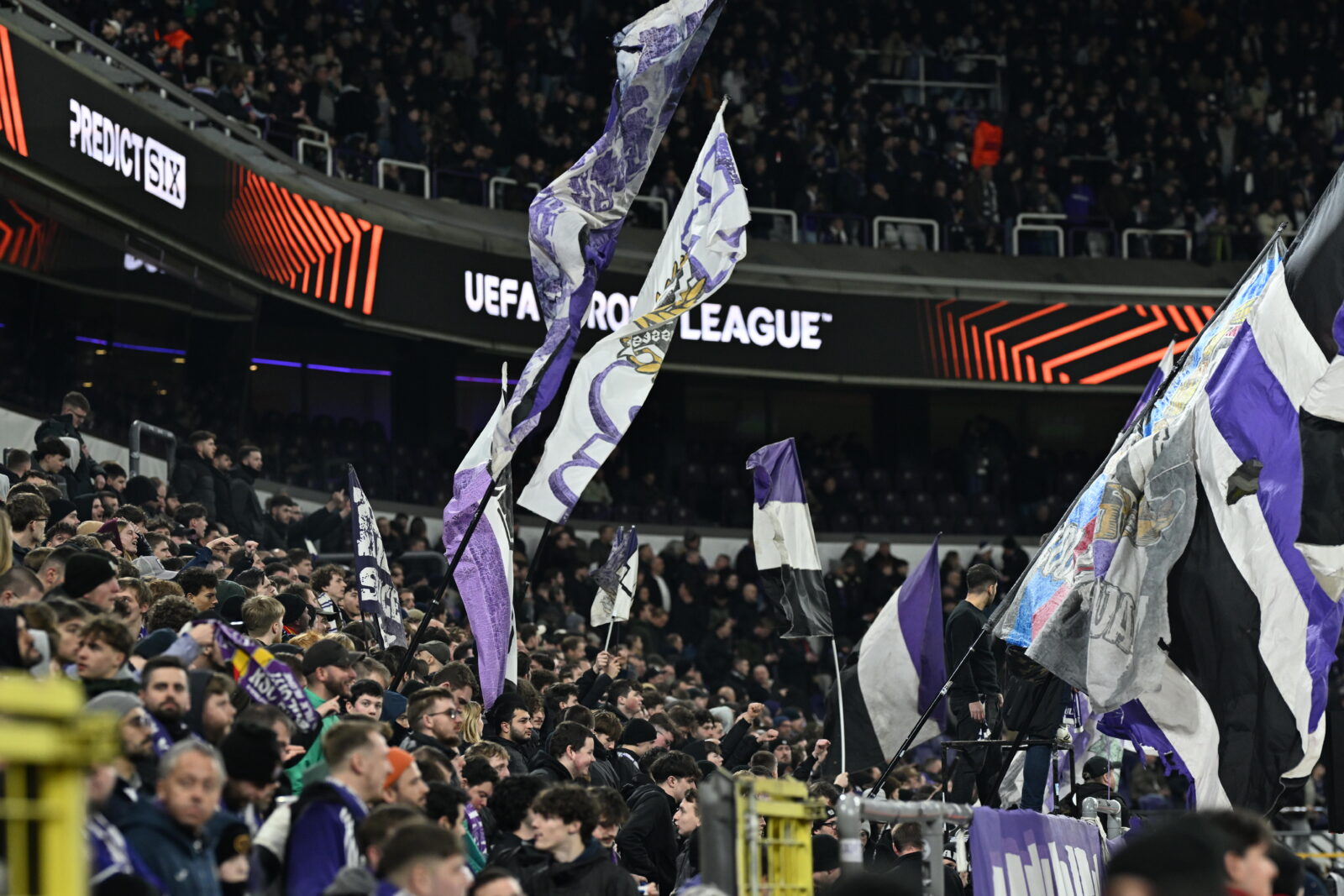 Fans of Anderlecht are seen after the referee suspends the game due to unappropriated behaviors among the spectators during the UEFA Europa League knockout play-off football match between Anderlecht and Fenerbahce at Lotto Park in Brussels, Belgium, Feb. 20, 2025. (AA Photo)