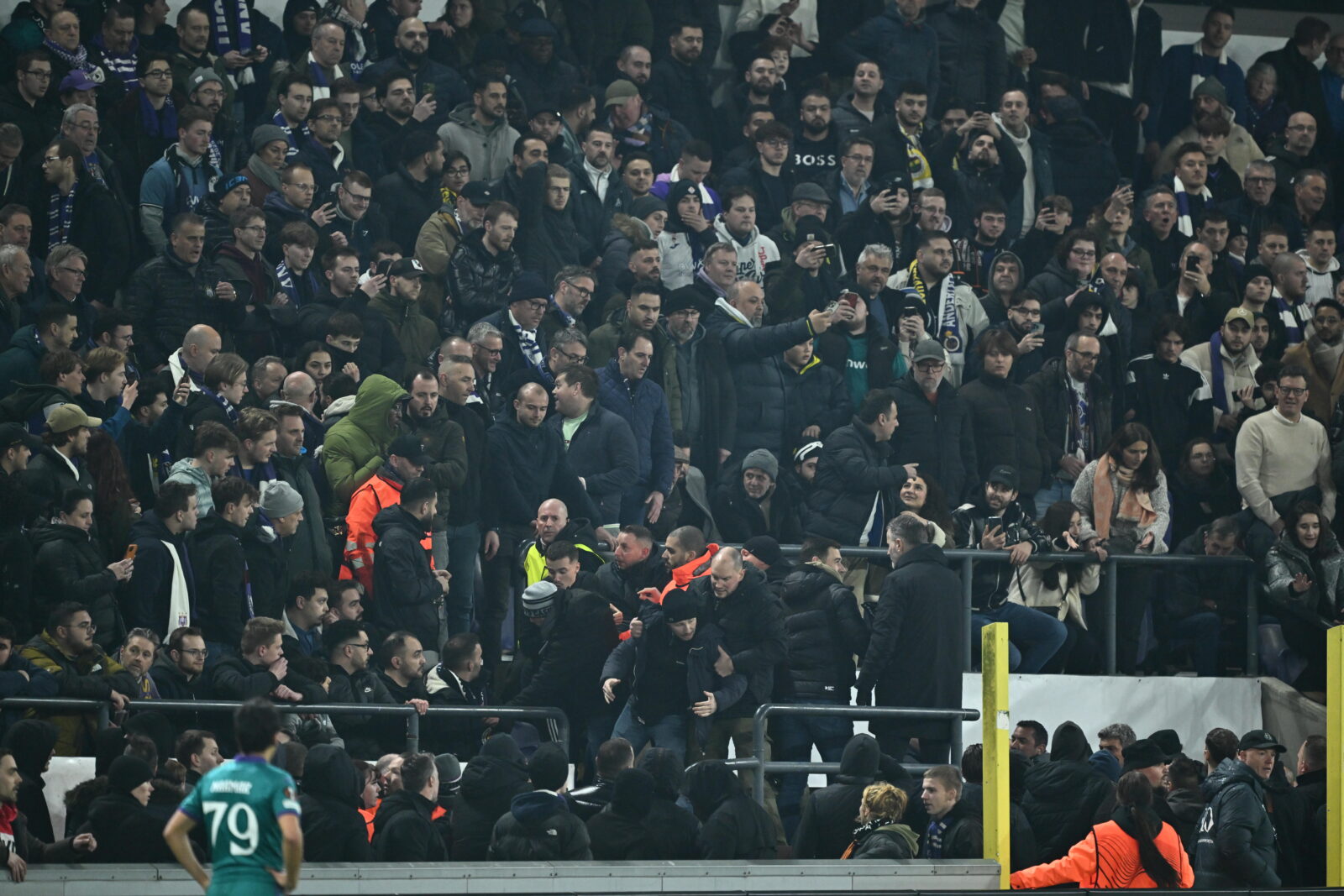Referee of the match suspends the game due to unappropriated behaviors among the spectators during the UEFA Europa League knockout play-off football match between Anderlecht and Fenerbahce at Lotto Park in Brussels, Belgium, Feb. 20, 2025. (AA Photo)