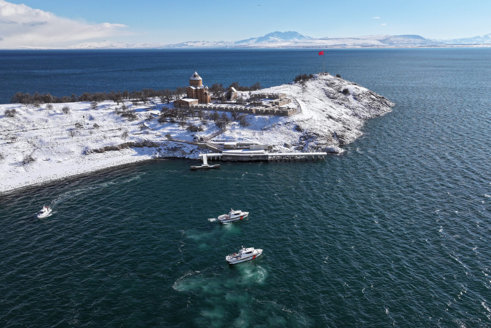 An aerial view of Akdamar Island, located in the middle of Lake Van and renowned for its natural beauty, after a snowfall in the Gevas district of Van, Türkiye, Feb. 22, 2025. (AA Photo)