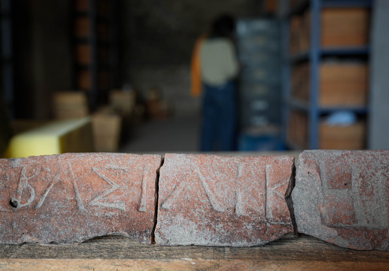 A roof tile with the inscription 