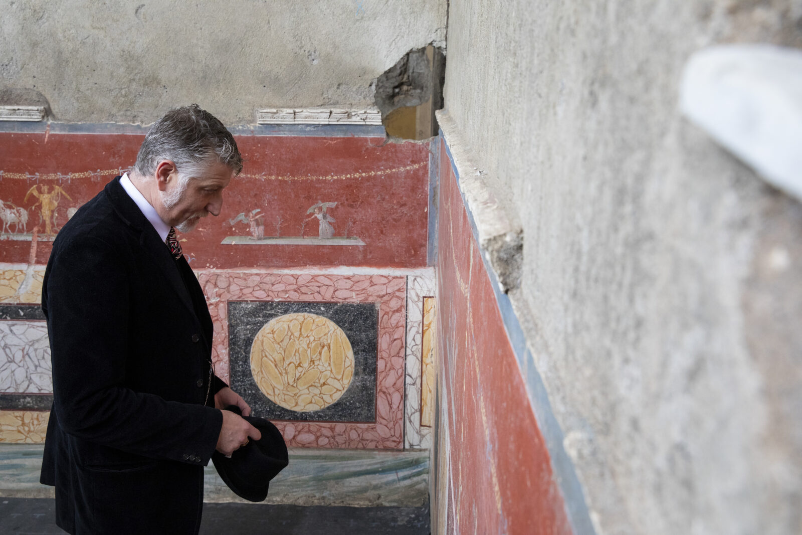 Italian Minister of Culture Alessandro Giuli is seen at Regio IX after the presentation of the large Dionysian-themed fresco inside the Archaeological Park of Pompeii, near Naples, Italy, Feb. 26, 2025. (AA Photo)
