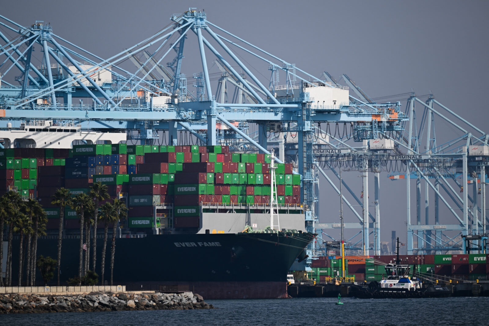 Cargo shipping containers sit on the Evergreen Ever Fame container ship docked at a container terminal at the Port of Los Angeles in Los Angeles, California on Feb. 3, 2025. (AFP Photo)