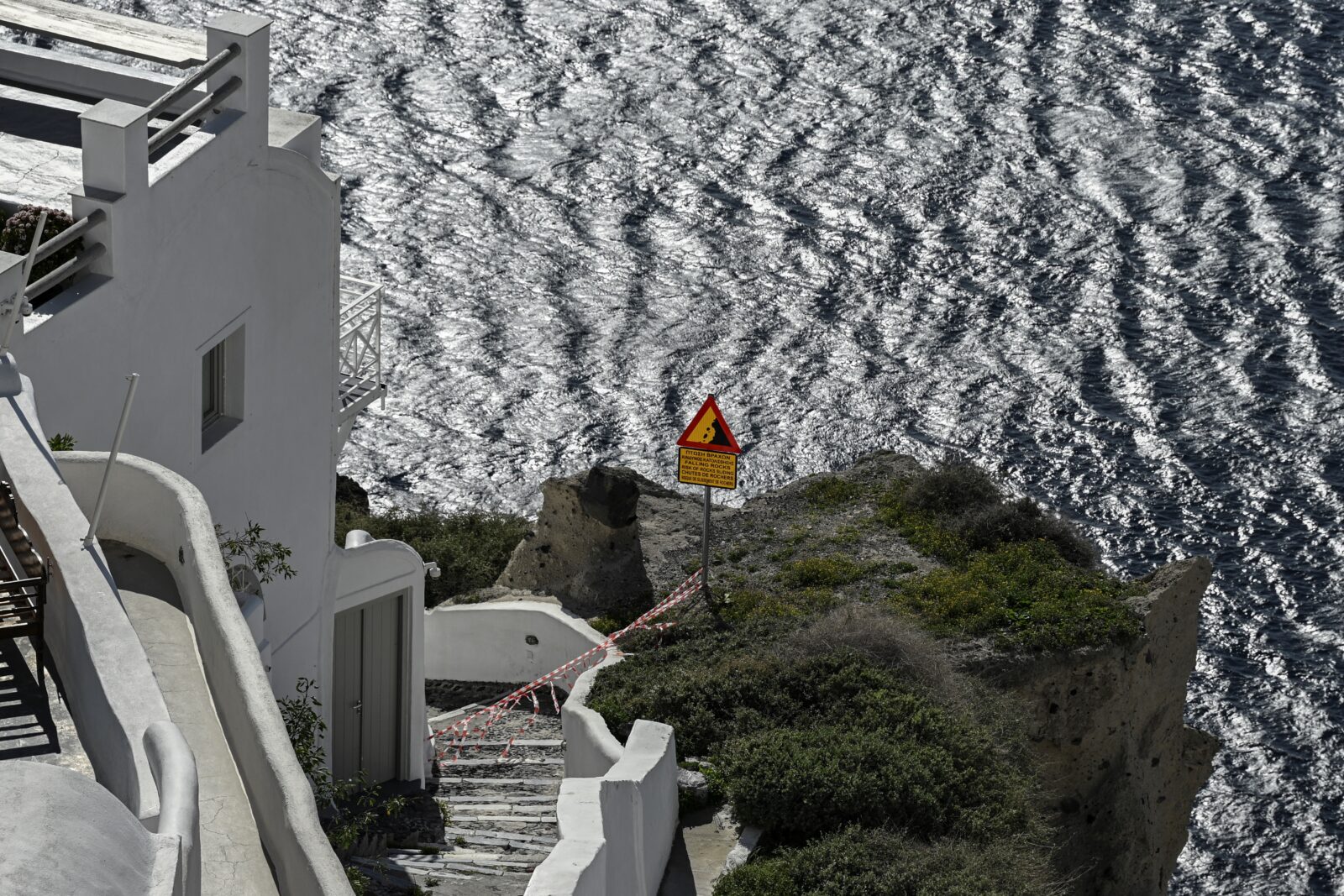 This photograph shows caution tapes placed to restrict access for tourists as a precaution due to recent seismic activities in Oia village on the Greek island of Santorini, Feb. 5, 2025. (AFP Photo)
