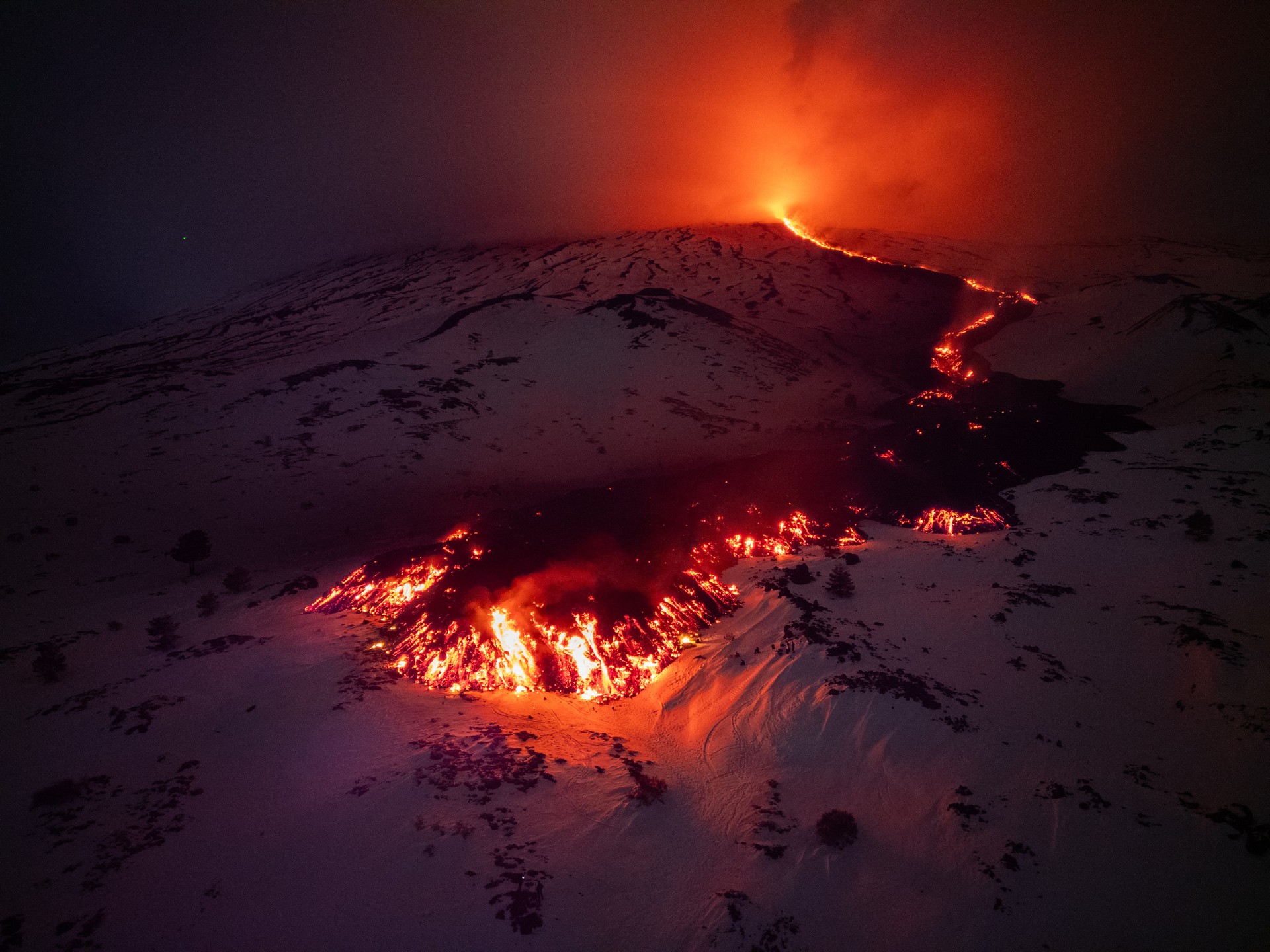 Italy's Etna Volcano spews ash, lava again, locals report Image