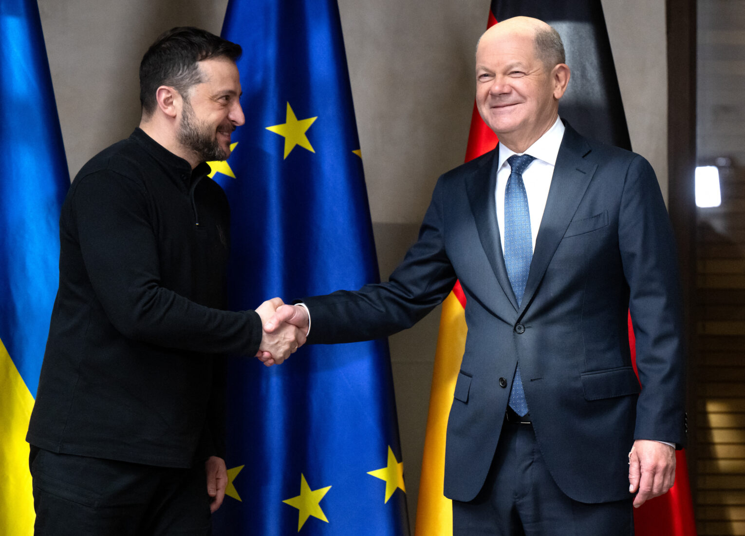 German Chancellor Olaf Scholz (R) shakes hands with Ukrainian President Volodymyr Zelenskyy during a bilateral meeting on the sidelines of the 61st Munich Security Conference (MSC) in Munich, southern Germany, on Feb. 15, 2025. (AFP Photo)