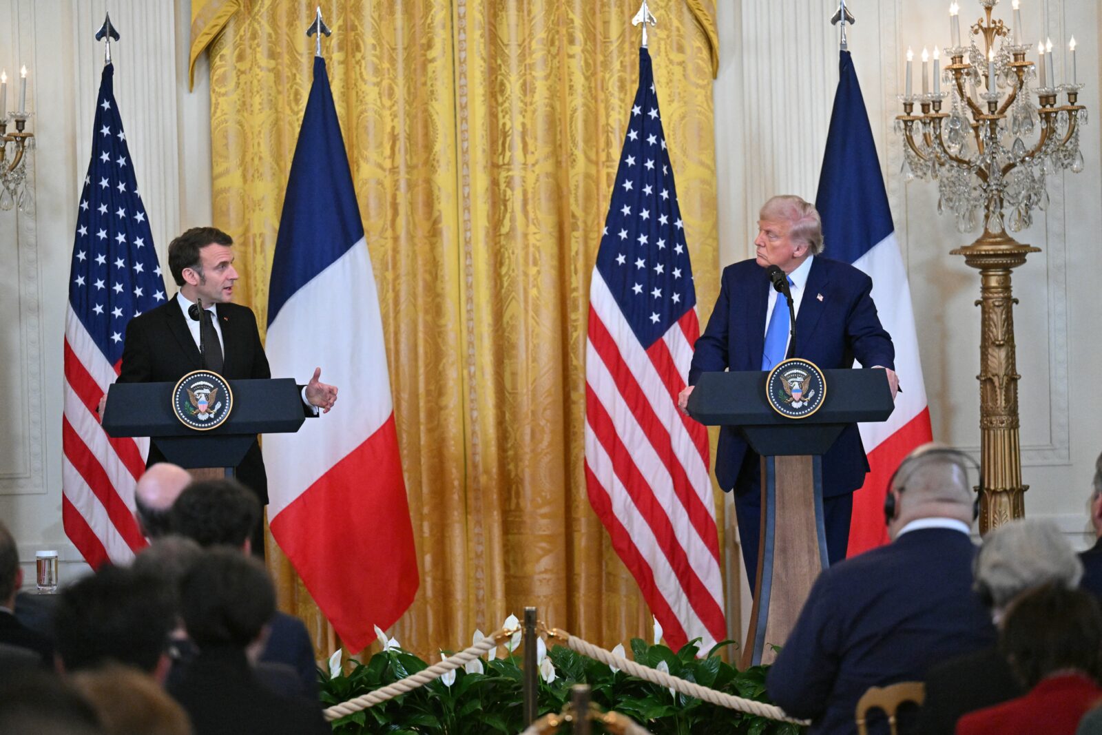 U.S. President Donald Trump (R) and French President Emmanuel Macron (L) hold a joint press conference in the East Room to the White House in Washington, United States, Feb. 24, 2025. (AFP Photo)