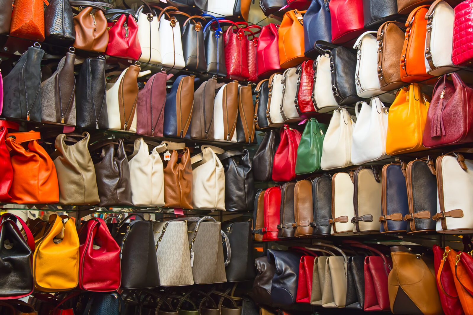 Replica bags for sale on a narrow street near the Grand Bazaar in Istanbul, Türkiye, on May 3, 2015. (Adobe Stock Photo)