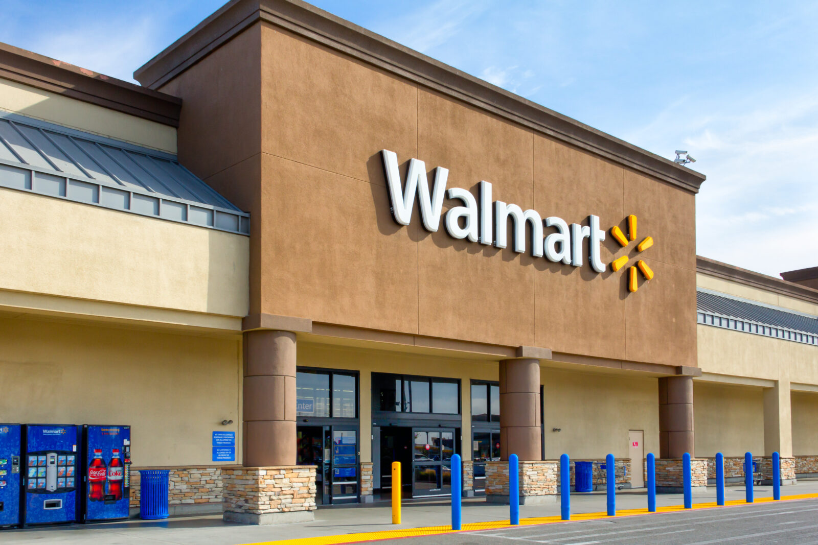 File photo shows the exterior of a Walmart store, with its recognizable logo prominently displayed. (Adobe Stock Photo)