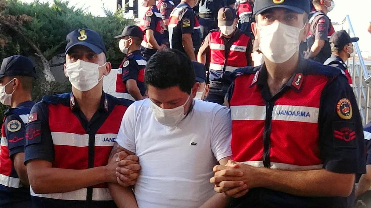 Cemal Metin Avci, convicted of brutally murdering university student Pinar Gultekin, escorted by gendarmerie officers in handcuffs, Türkiye, published on Feb. 3, 2025. (Türkiye Daily Photo)
