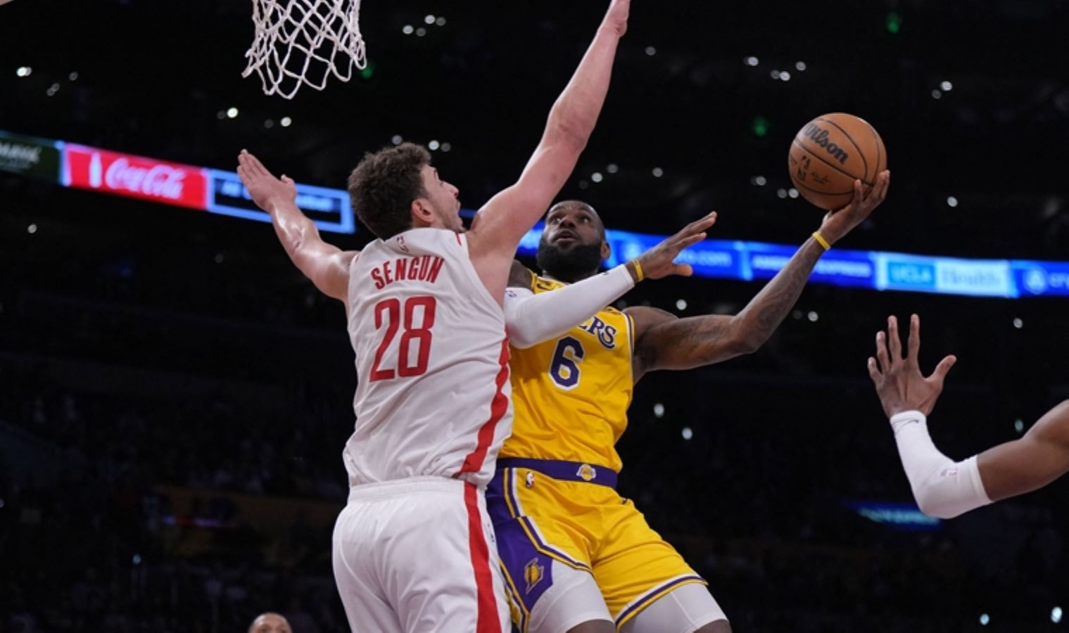 Alperen Sengun and LeBron James in action (via X)
