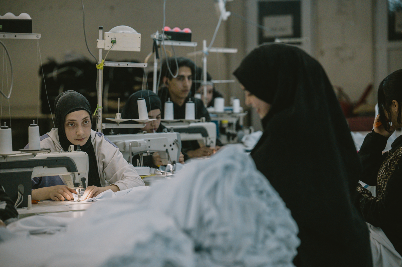 Syrian textile employees work in a textile workshop in Gaziantep, Türkiye, Jan. 30, 2025. (AFP Photo)