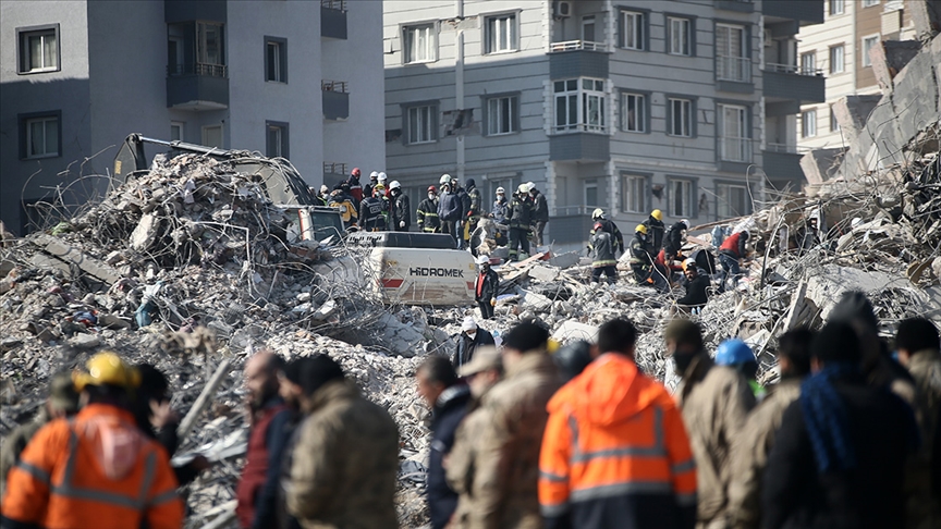Search and rescue teams work tirelessly to recover survivors and victims from the ruins of a collapsed building, Hatay, Türkiye, Feb. 3, 2024. (AA Photo)