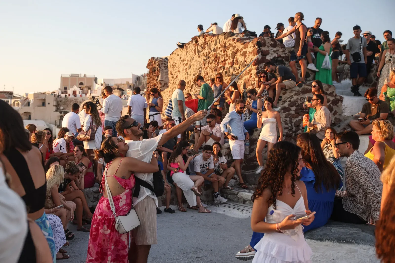 Crowds gather to witness the famous sunset on Santorini, one of Europe’s most overtouristed destinations. (AFP Photo)
