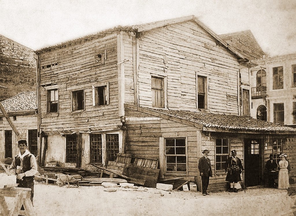 The original wooden church. (Photo via Wikimedia)