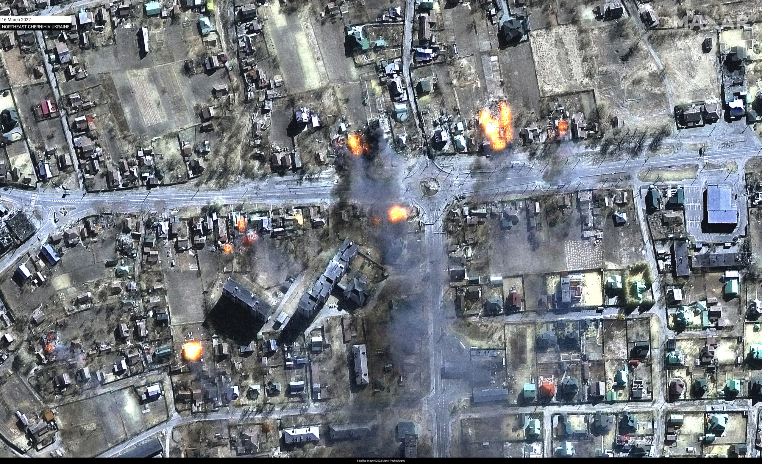 Multispectral satellite image showing burning homes in a residential area of Chernihiv, Ukraine, on March 17, 2022. (Satellite image via MAXAR Technologies)