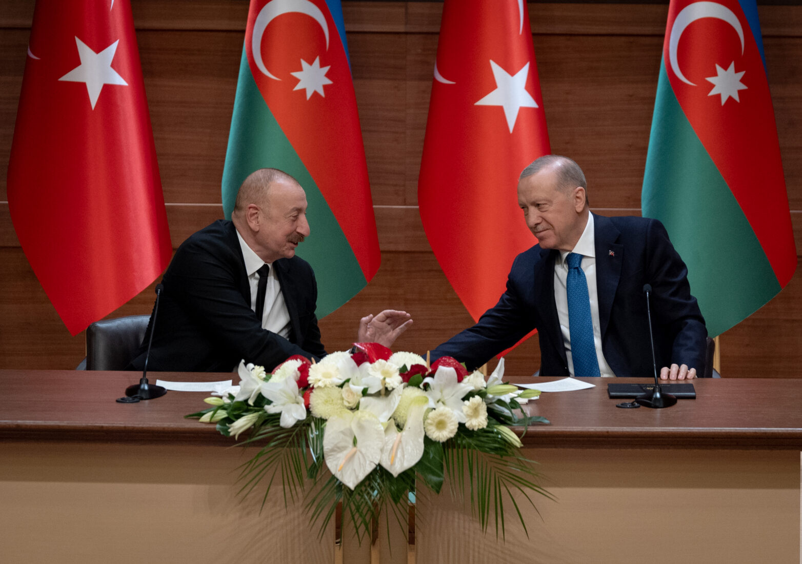 President Recep Tayyip Erdogan (R) and Azerbaijani President Ilham Aliyev (L) shake hands during the opening ceremony of Igdir-Nakhchivan Natural Gas Pipeline at Presidential Complex in Ankara, Türkiye on March 05, 2025. (AA Photo)