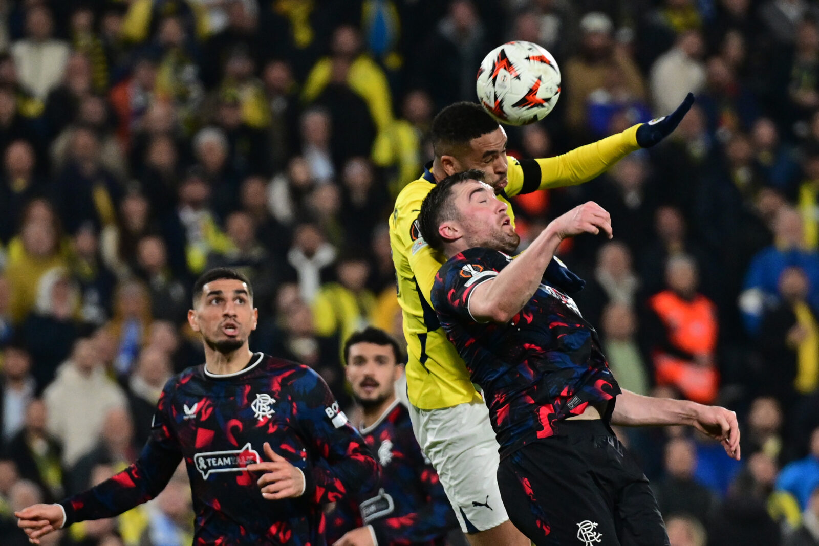 Youssef En-Nesyri of Fenerbahce in action against John Souttar of Rangers during the UEFA Europa League round of 16 first-leg match between Fenerbahce and Rangers at Ulker Stadium in Istanbul, Türkiye on March 06, 2025. (AA Photo)