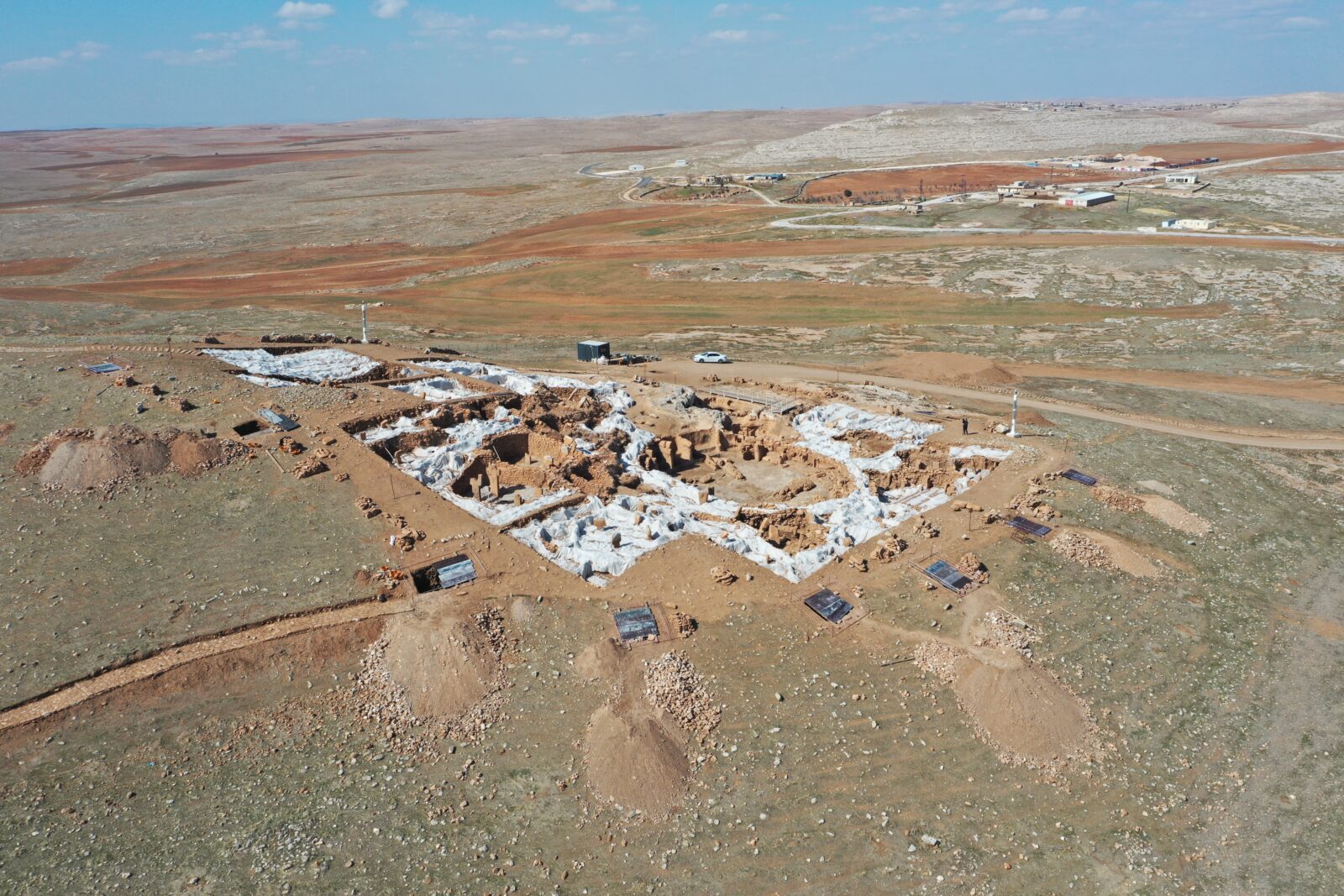 A protective roof is being constructed for artifacts unearthed during excavations at Karahantepe Archaeological Site in Sanliurfa, one of the important settlements of the Neolithic era. (AA Photo)