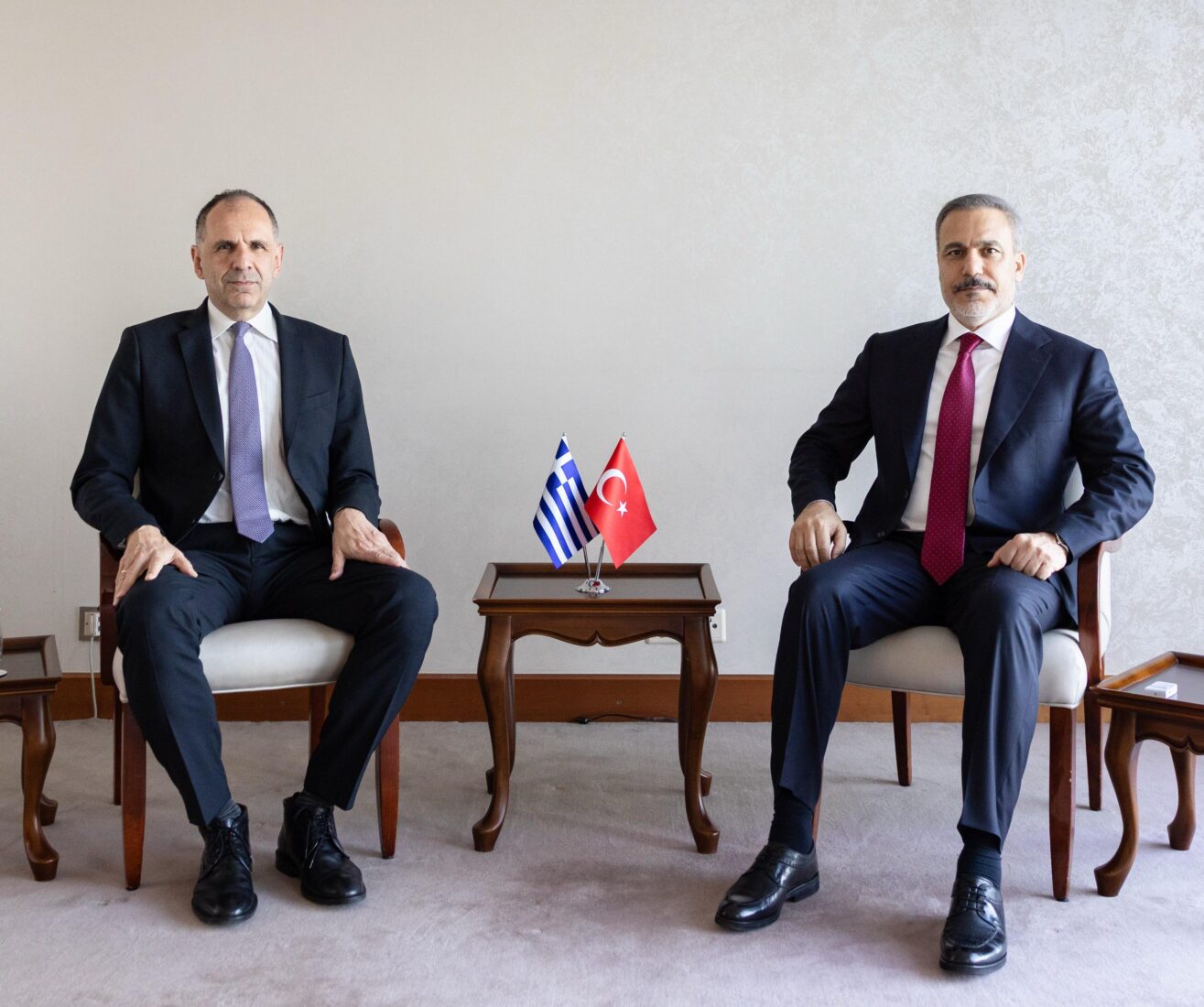 Foreign Minister Hakan Fidan (R) meets with Greek Foreign Minister Giorgos Gerapetritis (L) in Geneva, Switzerland, on March 18, 2025. (AA Photo)