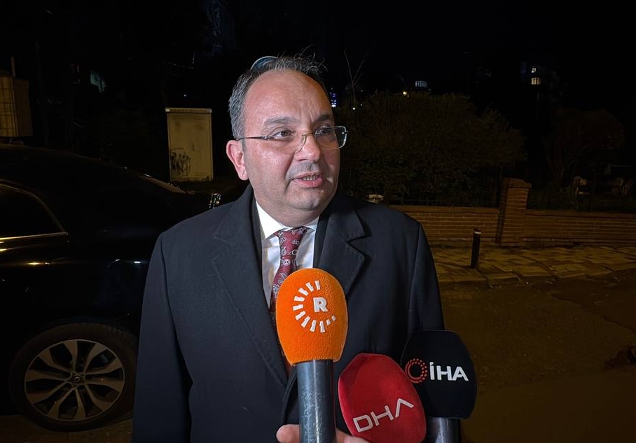 Sisli District Governor Cevdet Erturkmen speaking in front of the consulate building where the attack took place, received information from the authorities and made statements to the press members on March 21, 2025 (AA Photo)