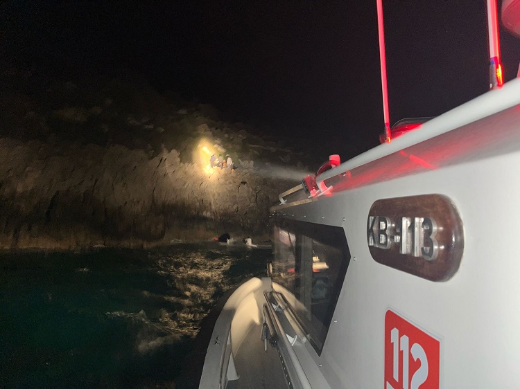 Rescue teams save 14 irregular migrants, including children, in Marmaris district of Mugla. (Coast Guard Command)