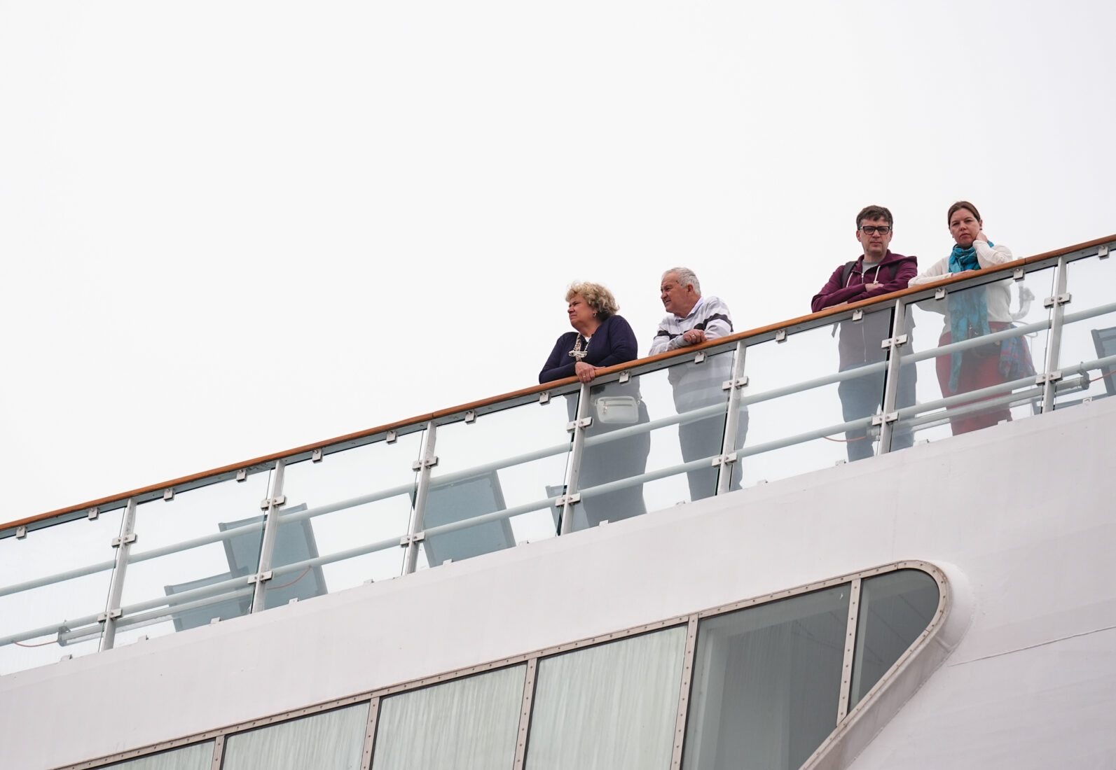 Tourists stand on the deck of a cruise ship docked in Izmir, Türkiye, on Mar. 29, 2025. (AA Photo)