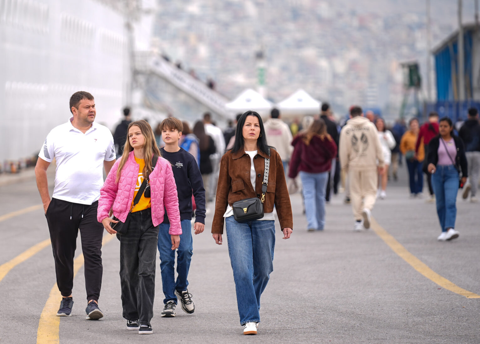Cruise tourists stroll along the port area after disembarking in Izmir, Türkiye, on Mar. 29, 2025. (AA Photo)