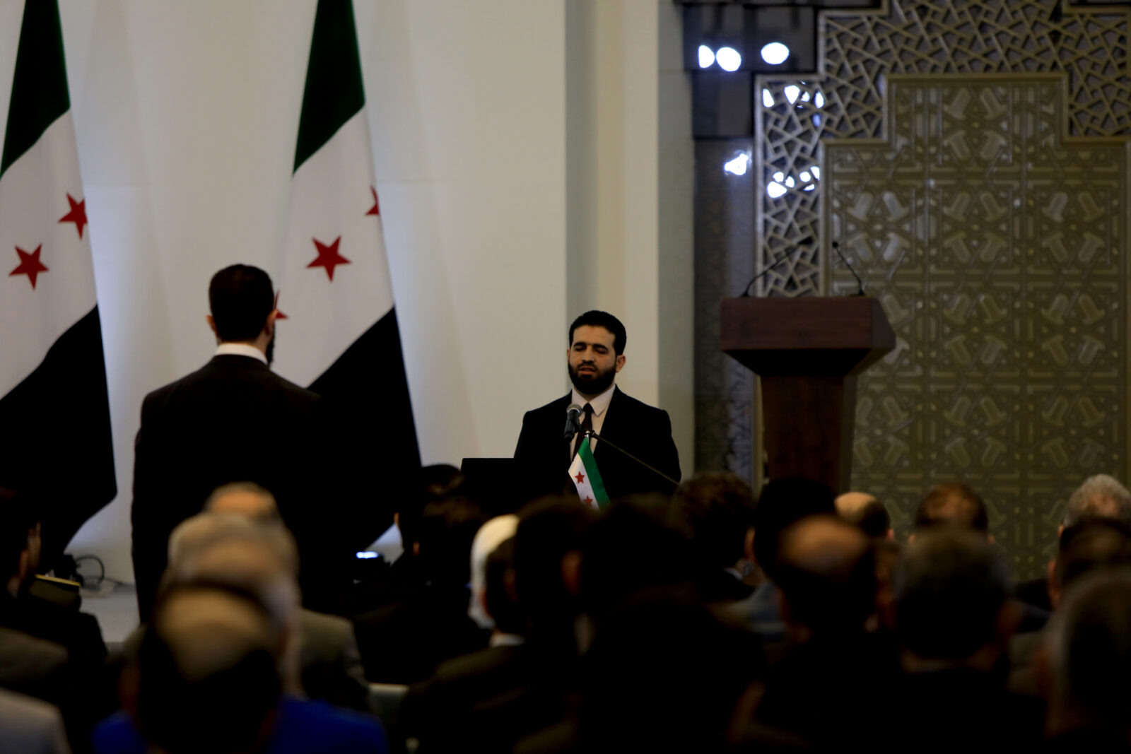 Interior Minister Enes Hattab gives a speech at the swearing-in ceremony for the first cabinet after fall of the 61-year-old Ba'ath regime at the People's Palace in Damascus, Syria, March 30, 2025. (AA Photo)