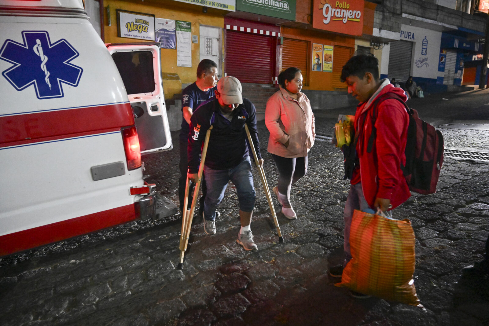 Evacuees arrive at a shelter after fleeing their village affected by Fuego volcano in Alotenango, a municipality in Sacatepequez department some 65 kilometres southwest of Guatemala City, on March 10, 2025. (AFP Photo)