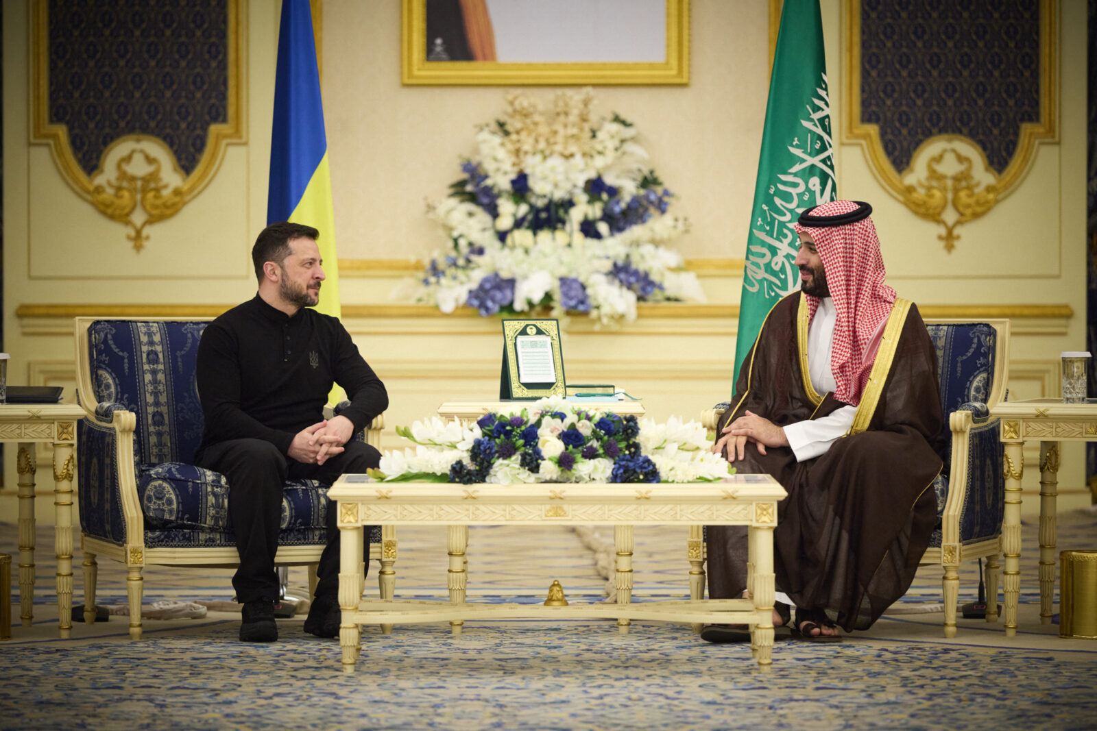 This handout photograph taken and released by the Ukrainian Presidential Press Service on March 10, 2025, shows Ukrainian President Volodymyr Zelenskyy (L) and Saudi Crown Prince Mohammed bin Salman (R) during a meeting at the Royal Palace in Jeddah, amid the Russian invasion of Ukraine. (AFP Photo)