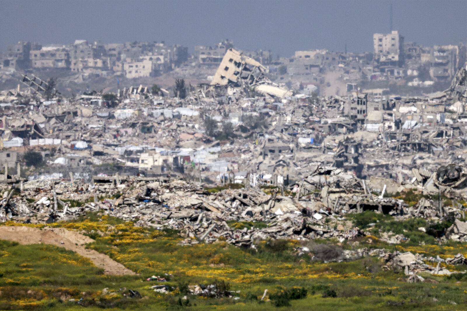 Destroyed buildings are pictured in the northern Gaza Strip from across the border in southern Israel on March 18, 2025. (Menahem Kahana/AFP Photo)