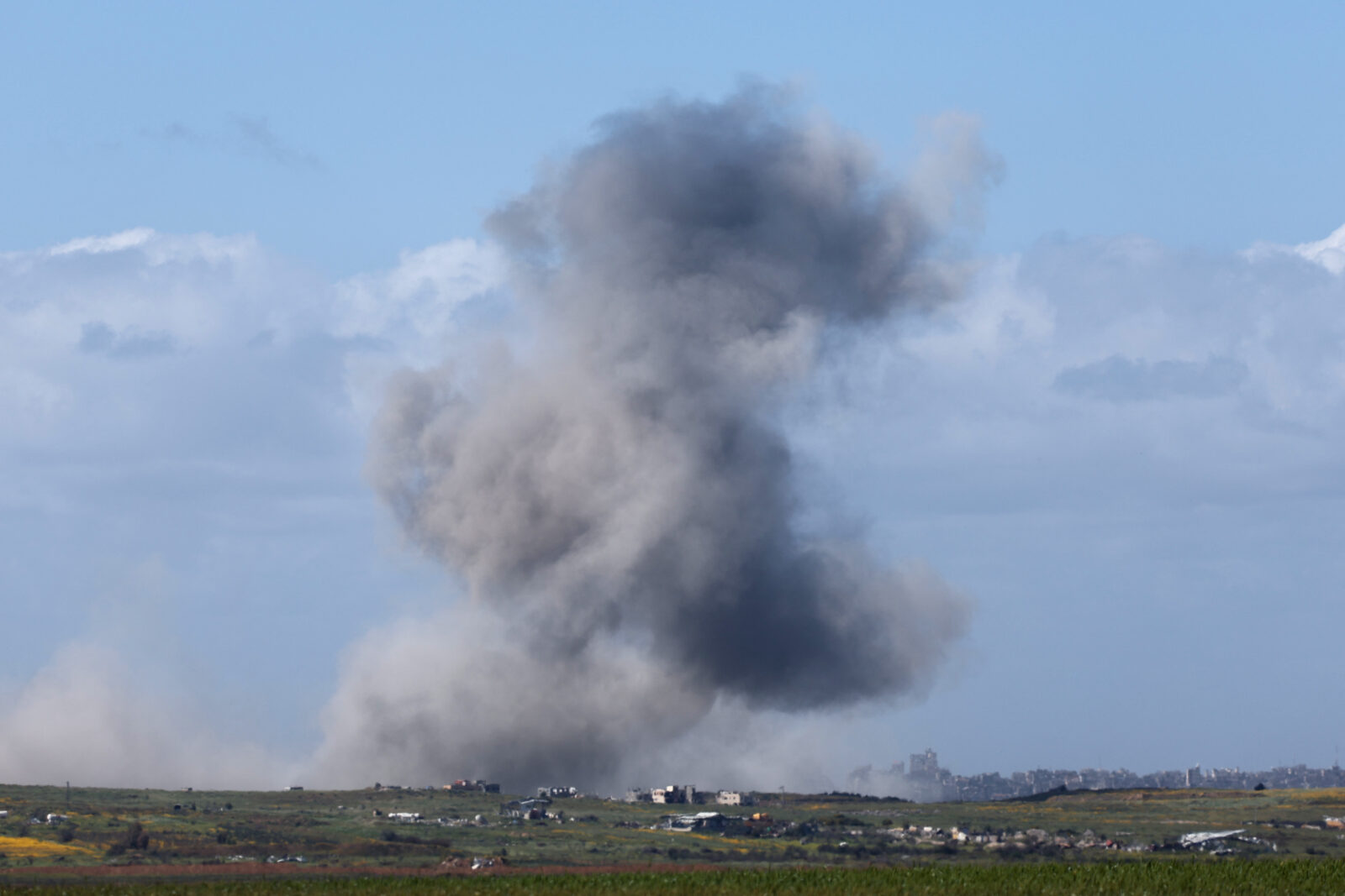 This picture taken from Israel's southern border with the Gaza Strip shows smoke billowing after Israeli bombardment in northern Gaza, March 19, 2025. (AFP Photo)