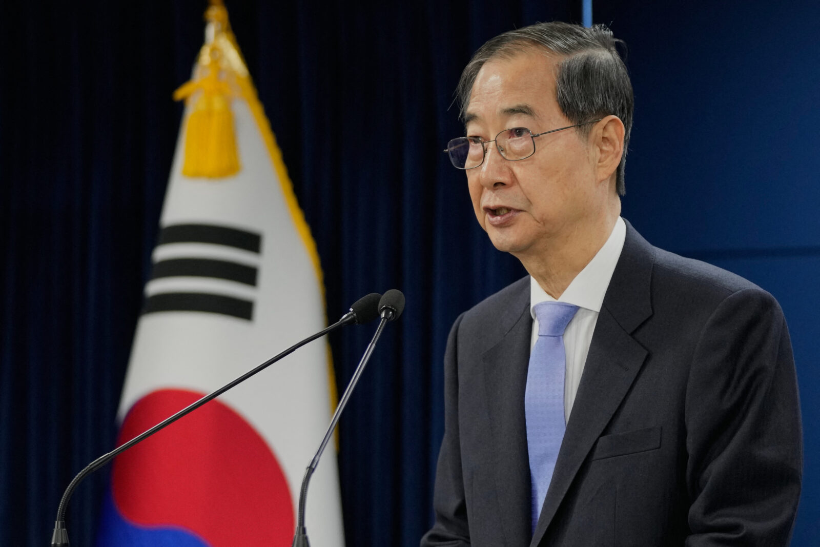 South Korean acting President Han Duck-soo speaks during a briefing at the Government Complex in Seoul on March 24, 2025. (AFP Photo)