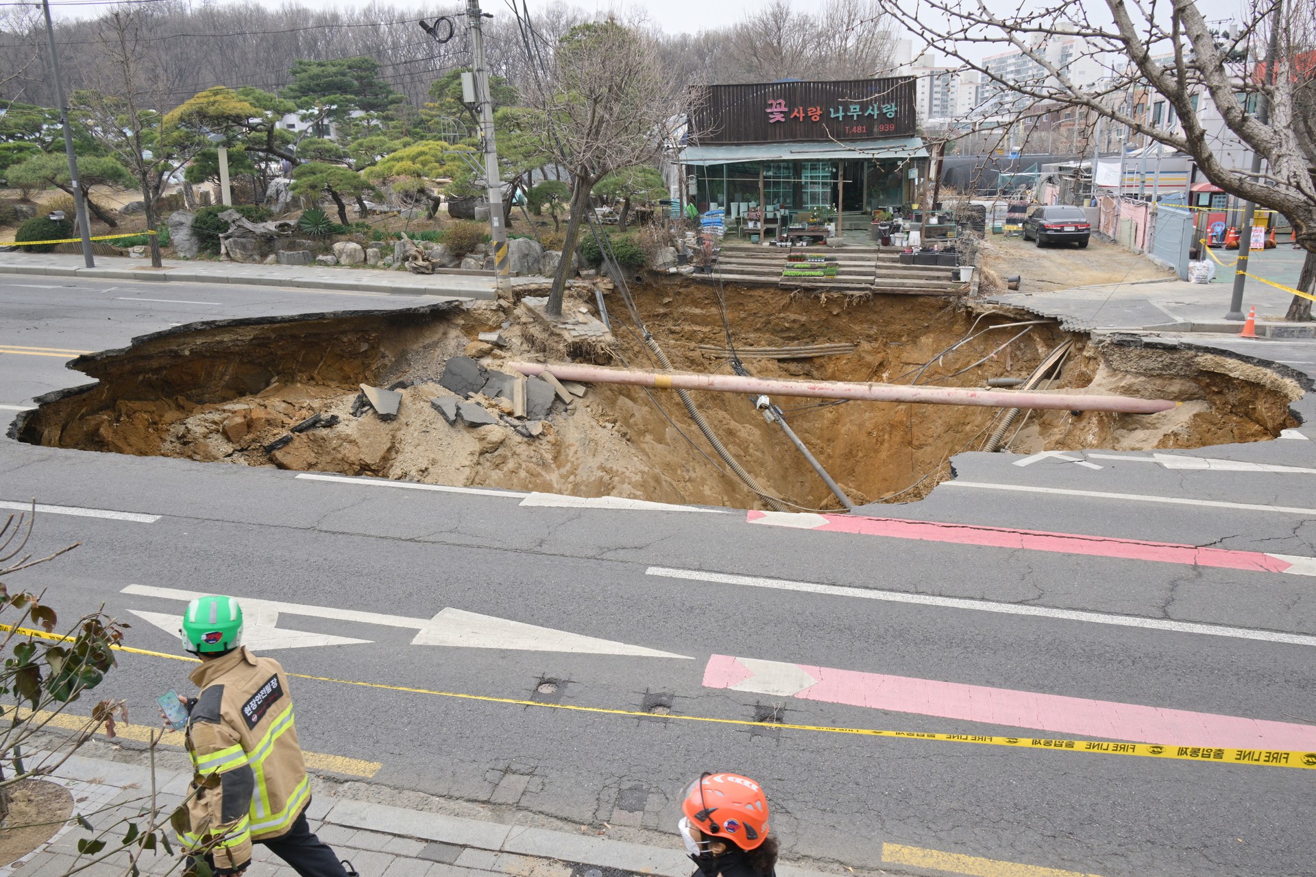 Motorcyclist dies after massive sinkhole opens in busy Seoul intersection