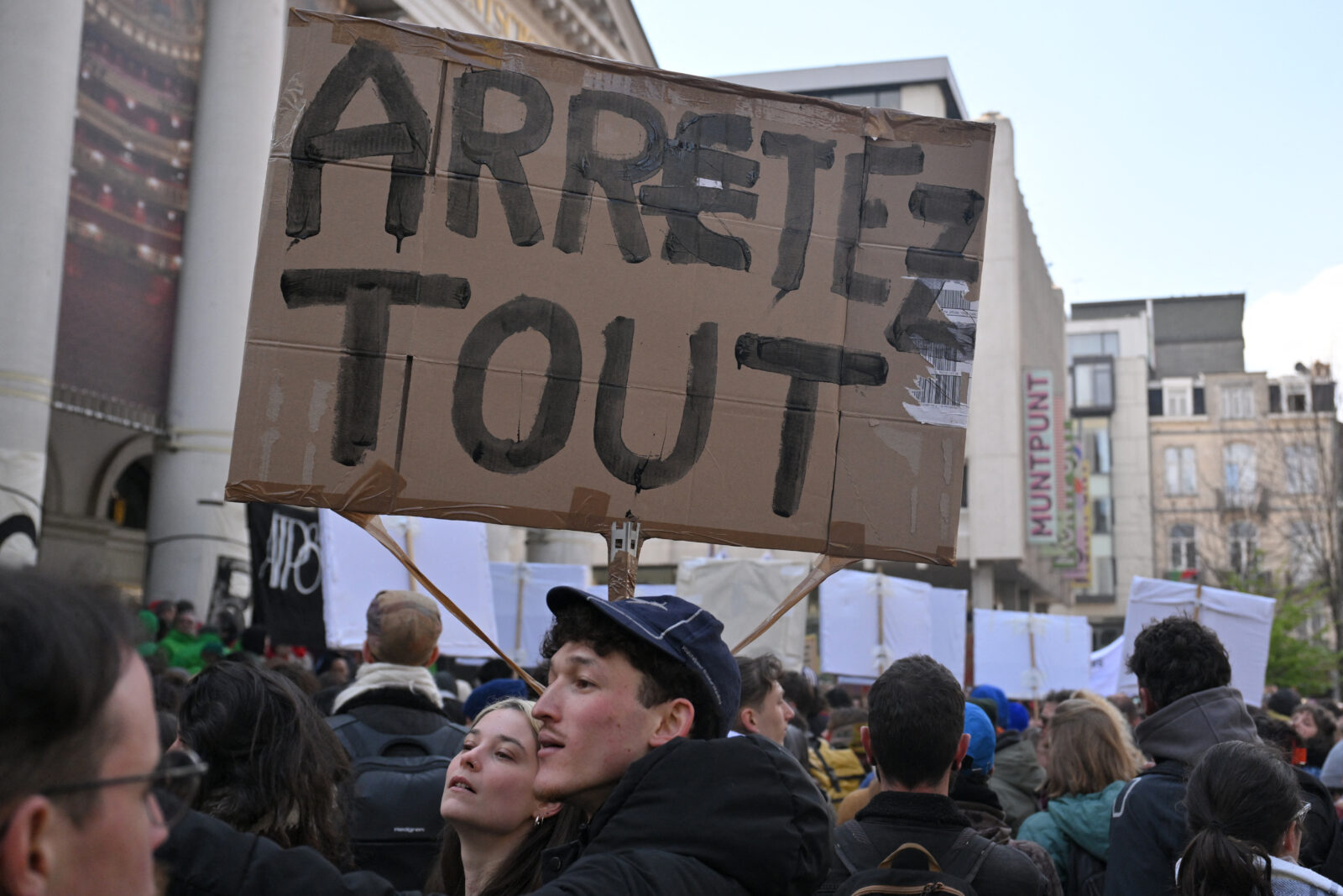 Protesters from the arts sector hold a placard reading 'Stop everything' during a demonstration as part of a national day of action against the Belgian government in Brussels, Belgium on March 31, 2025. (AFP Photo)