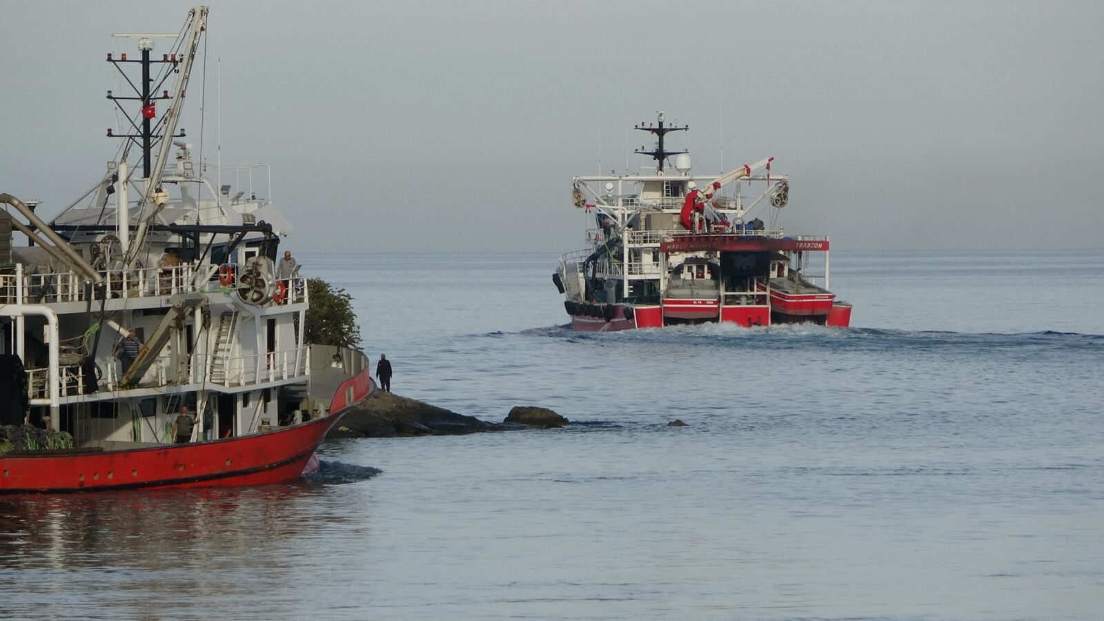 Fishing vessels operate in the Black Sea off the coast of Trabzon, Türkiye, on Mar. 22, 2025. (IHA Photo)