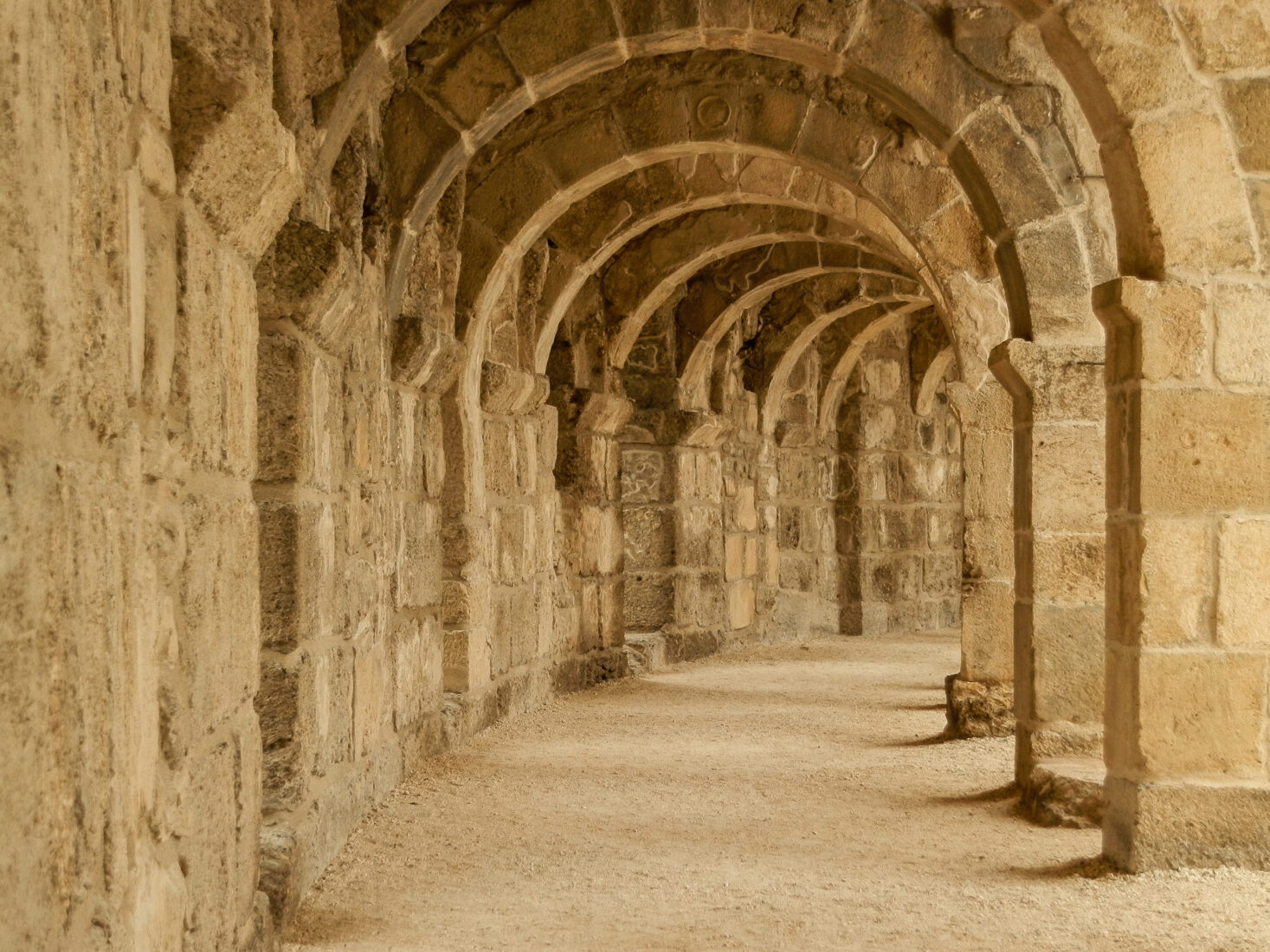 Arches of the top floor of Aspendos amphitheater, Antalya, Türkiye. (Adobe Stock Photo)