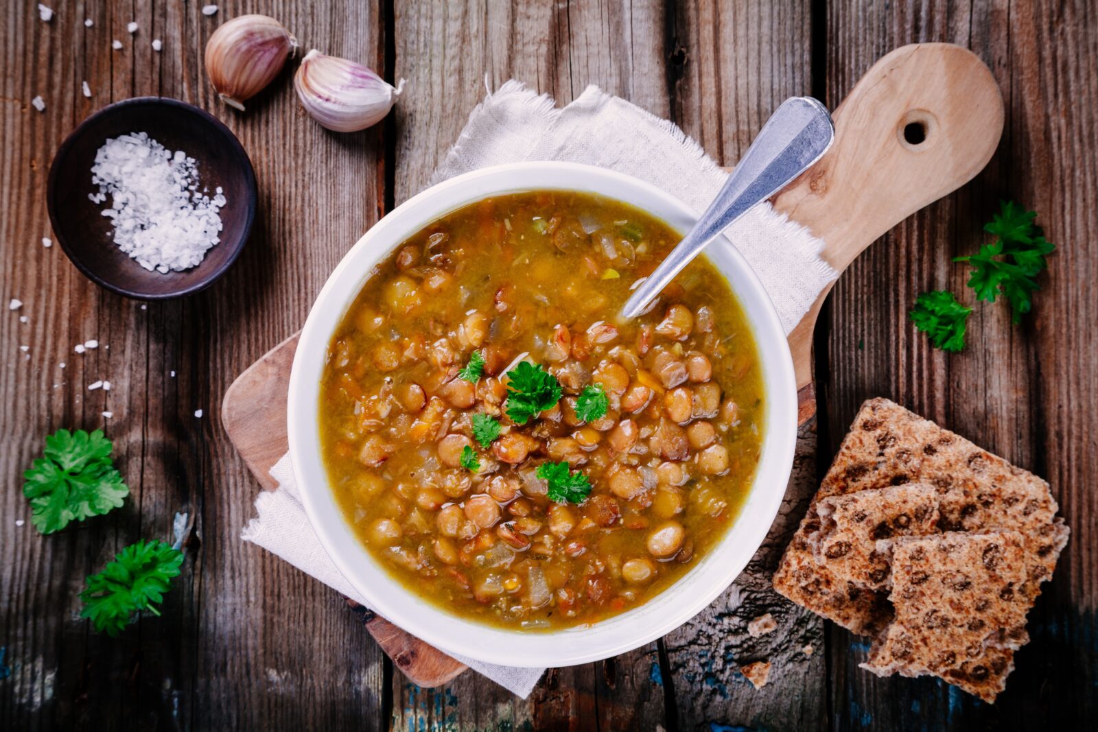 A warm and comforting green lentil and noodle soup, rich in protein and perfect for starting an iftar meal. (Adobe Stock Photo)
