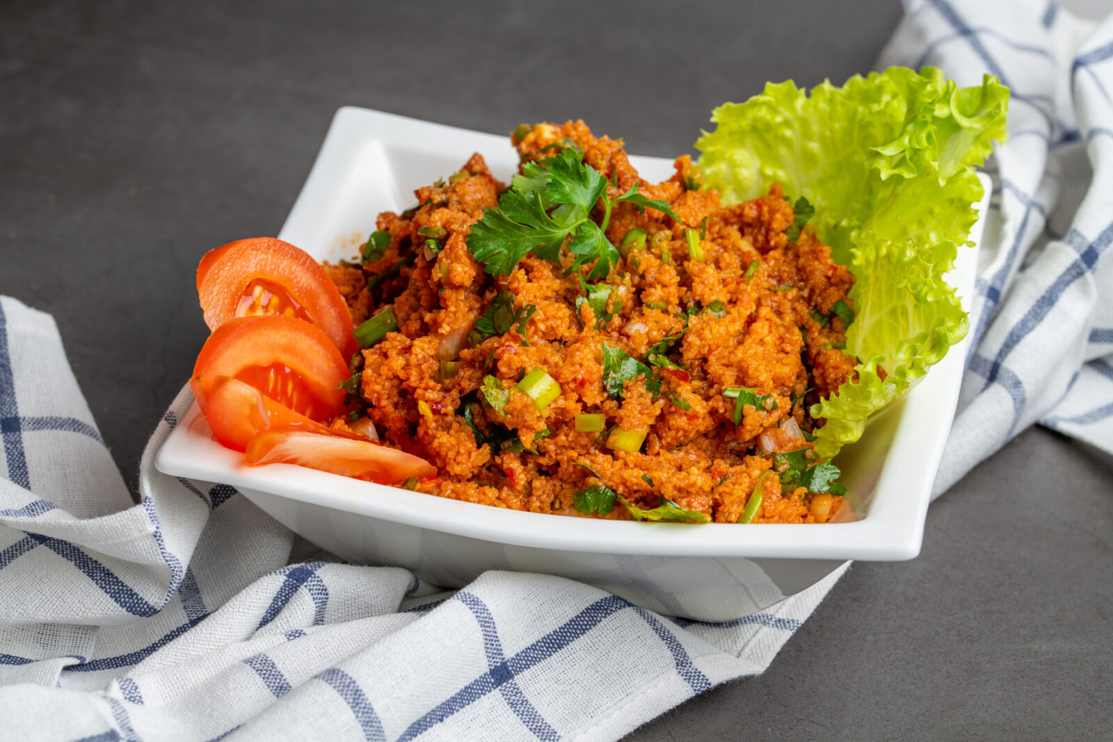 Kisir is a tangy bulgur salad made with pomegranate molasses. (Adobe Stock Photo)