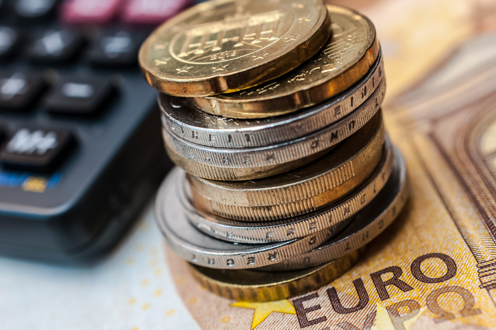 File photo shows a stack of euro coins placed on a euro banknote, accessed on March 3, 2025. (Adobe Stock Photo)