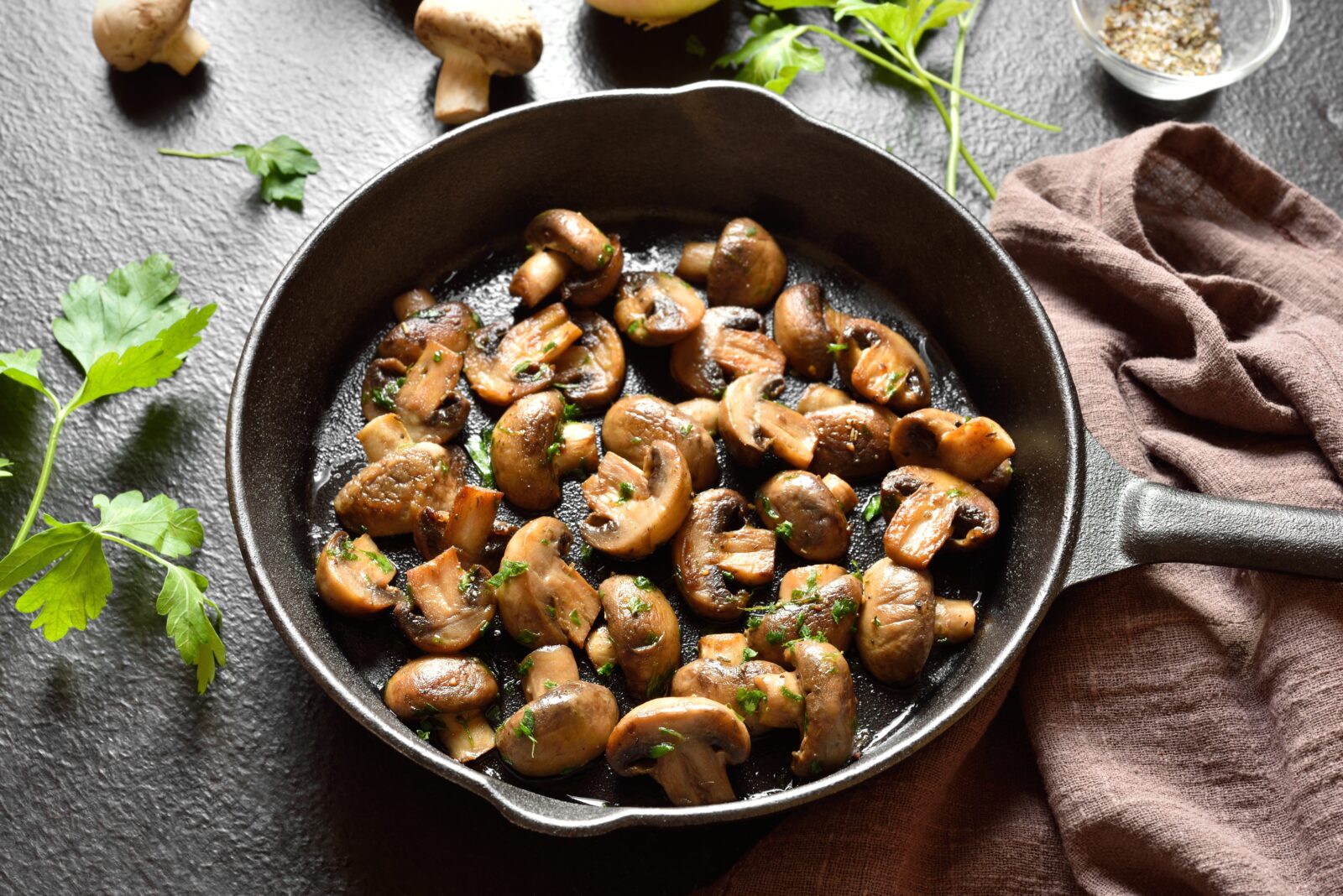 Mushrooms grilled until golden and slightly crisp, after being marinated in garlic yogurt—ideal for a light and earthy iftar starter. (Adobe Stock Photo)