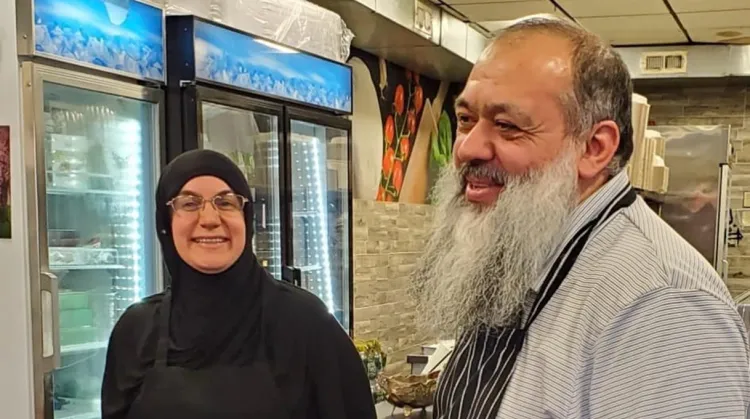 Celal Emanet (R) with his wife Emine Emanet (L) at the Jersey Kebab restaurant in Haddon Township. (Photo via X)