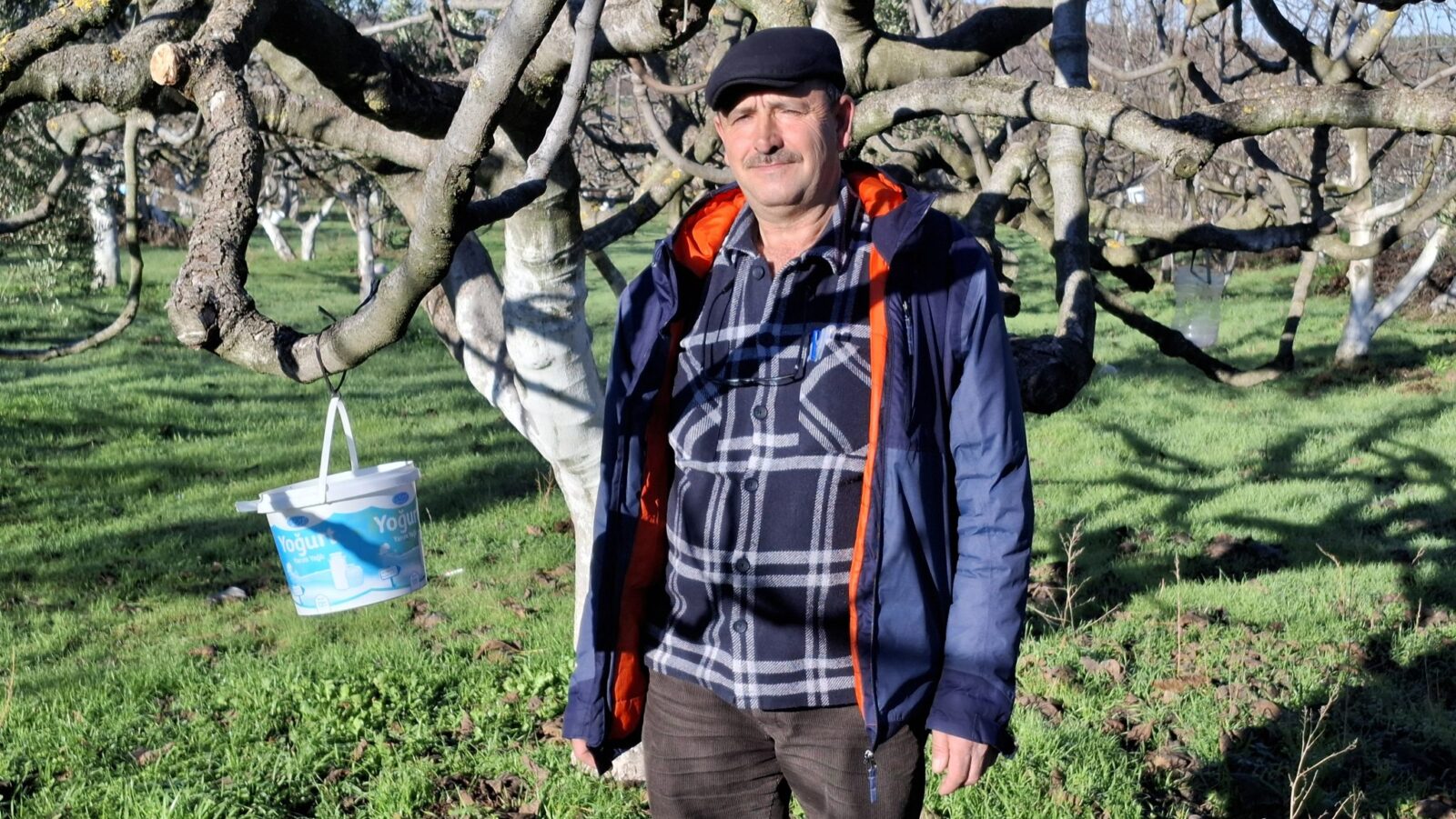 Erkan Firtina, a seasoned black fig producer, stands in his orchard in Bursa, Türkiye, Mar. 7, 2025. (Photo by Dilek Atli)
