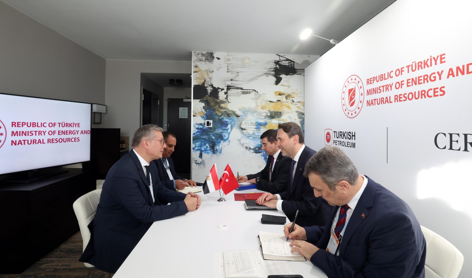 Turkish energy minister Alparslan Bayraktar meets his Egyptian counterpart Karim Badawi during the CERAWeek2025 in Houston, U.S., on Mar. 12, 2025. (Photo via X/@aBayraktar1)