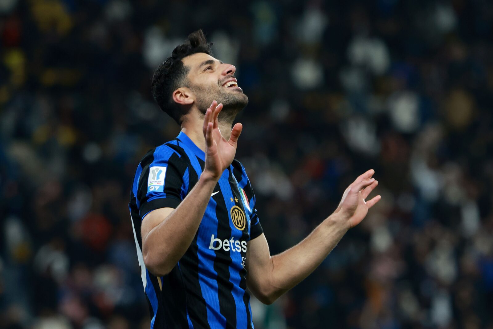 Mehdi Taremi of FC Internazionale celebrates scoring his team’s second goal during the Italian Super Cup Final between FC Internazionale and AC Milan at the Kingdom Arena on Jan. 6, 2025, in Riyadh, Saudi Arabia. (AFP Photo)