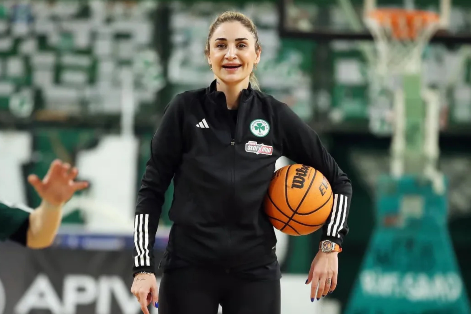 Selen Erdem happily watching the players during her first practice with Panathinaikos women's basketball team, Athens, Greece, March 11, 2025. (Photo via Instragram / @panathinaikos_1908)