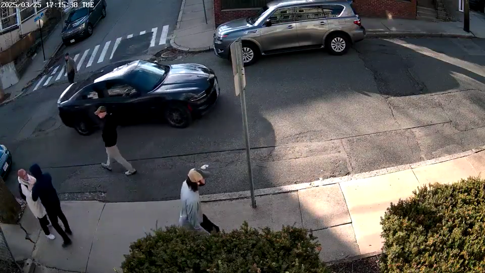 Screengrab from the surveillance video of Rumeysa Ozturk getting detained near her house by the US Immigration and Customs Enforcement (ICE) agents in Boston, USA (Video via X / @CollinRugg)
