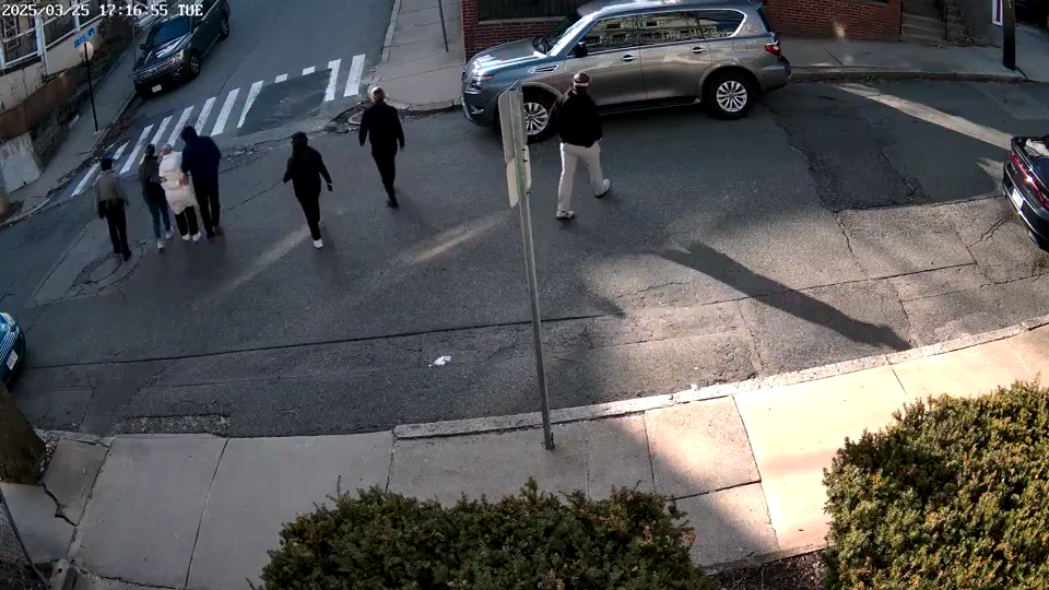 Screengrab from the surveillance video of Rumeysa Ozturk getting detained near her house by the US Immigration and Customs Enforcement (ICE) agents in Boston, USA (Video via X / @CollinRugg)
