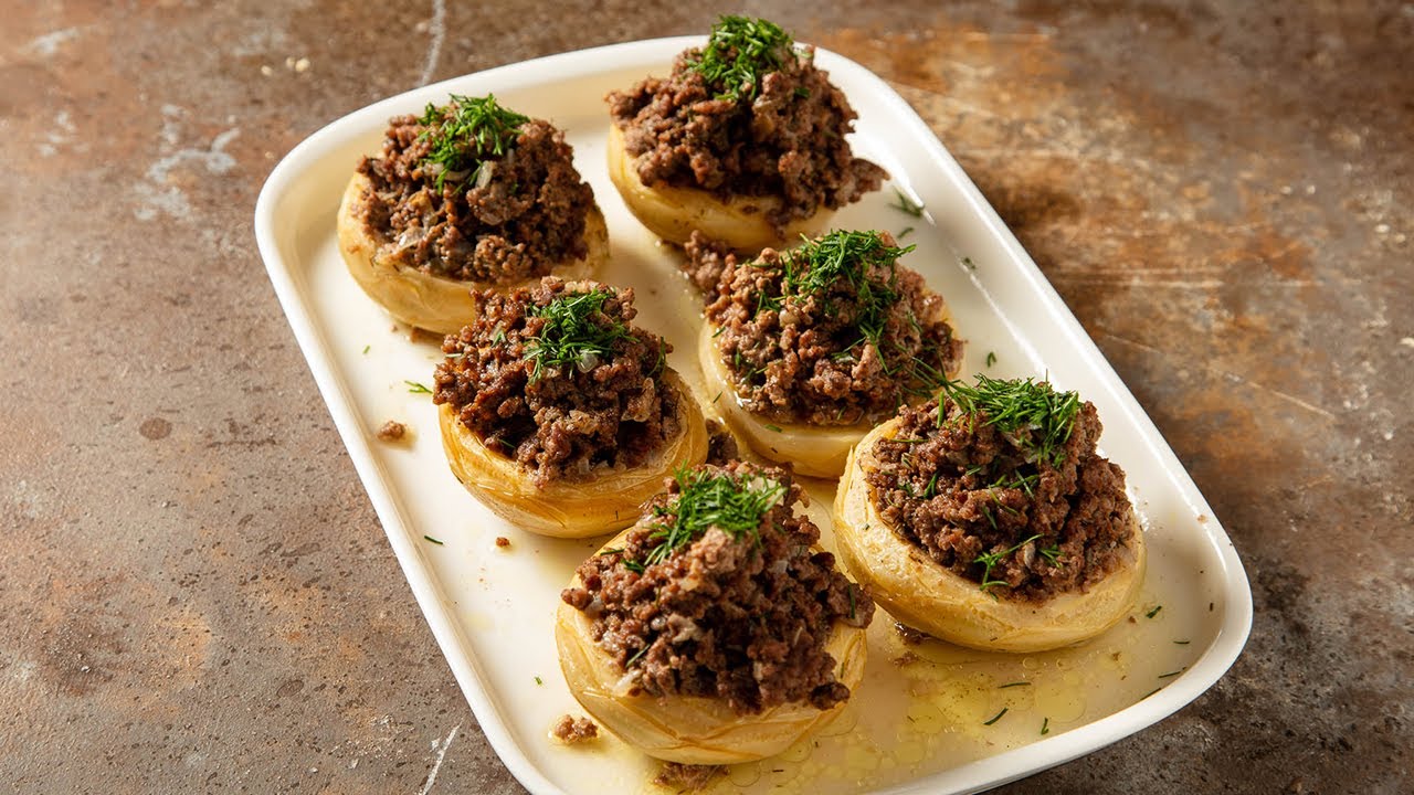 Savory artichokes stuffed with seasoned ground meat, a rich and hearty dish for iftar, Jun. 18, 2022. (Photo via YouTube)
